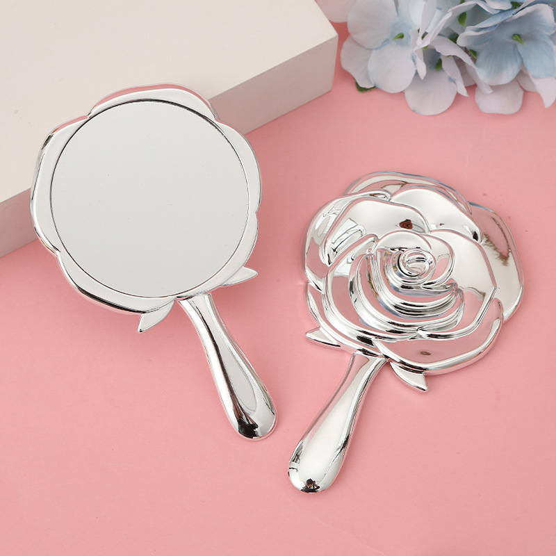 Rose Flower Lady Espejo de maquillaje plegable de mano Espejo de maquillaje pequeño y ligero galvanizado Espejo de regalo de color sólido