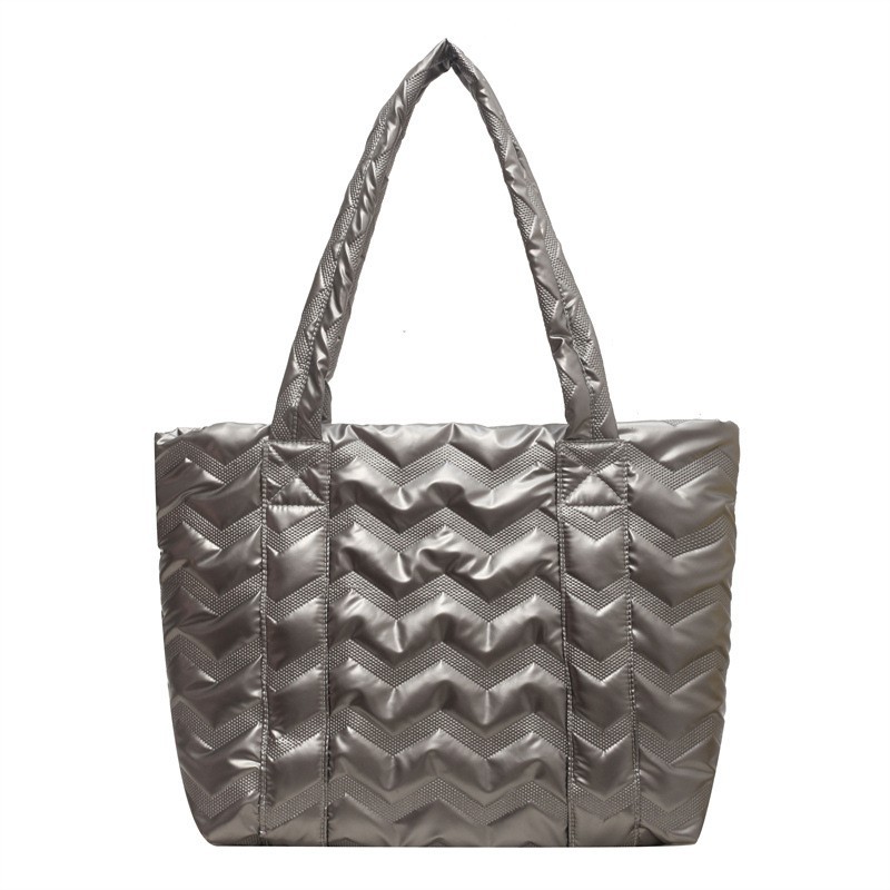 Bolso de las mujeres 2024 primavera nueva gran capacidad de algodón acolchado bolsa de asas de la moda todo-fósforo portátil de cercanías bolsa de hombro al por mayor