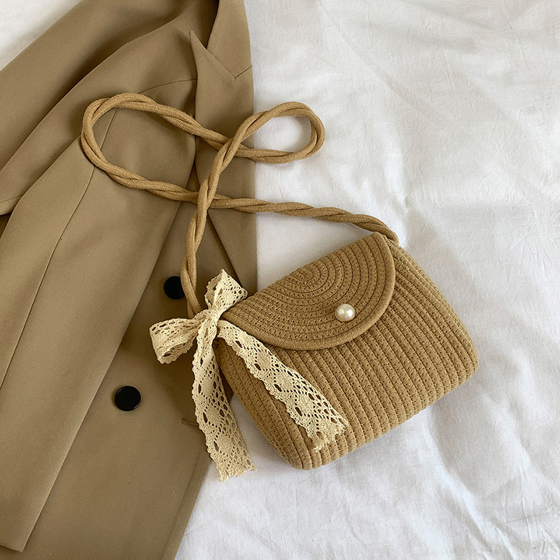 Bolso de tejido para mujeres 2024 nuevo verano cordón trenzado mochila de hombro bolso de hombro pequeño arco encantador