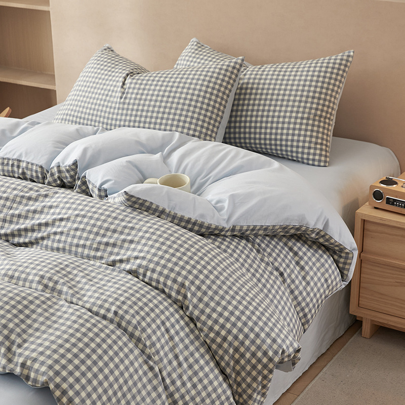 Nuevo traje de cama de algodón lavado de algodón de cuatro piezas de algodón 2025 nuevo traje de dormitorio de funda de edredón de sábana simple de tres piezas