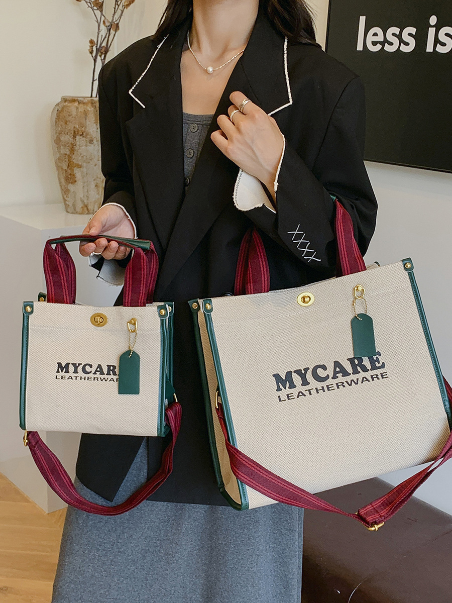 Bolsa de mano de lona de gran capacidad para mujeres 2024 nueva moda impresa letras mochilas bolsa de viaje casual