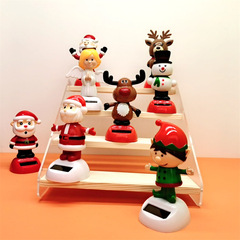 Cross-border Christmas solar-powered automatic swinging doll car shaking head decoration creative car car ornaments