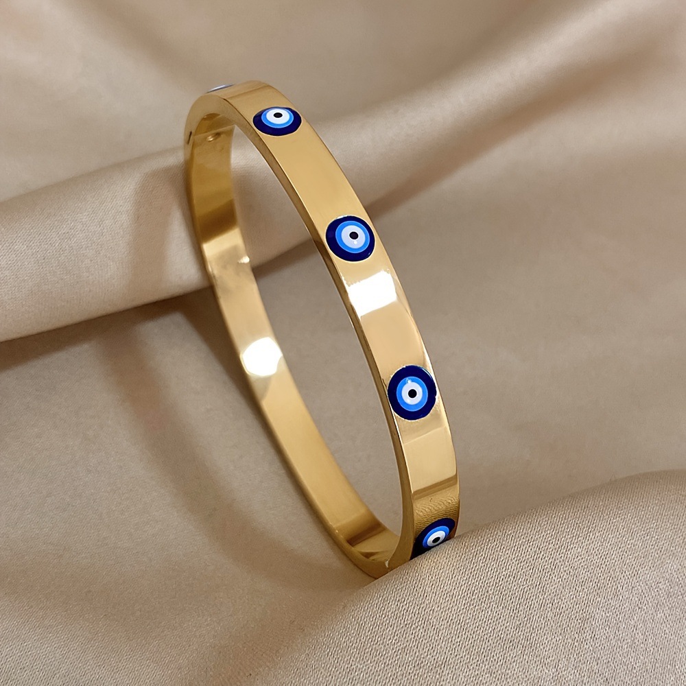 Guldbelagt evil eye armring för herr och dam_voghion.com
