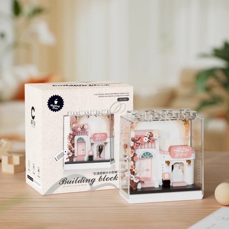 Hay una tienda de vestidos de boda con cubierta de polvo 350pcs