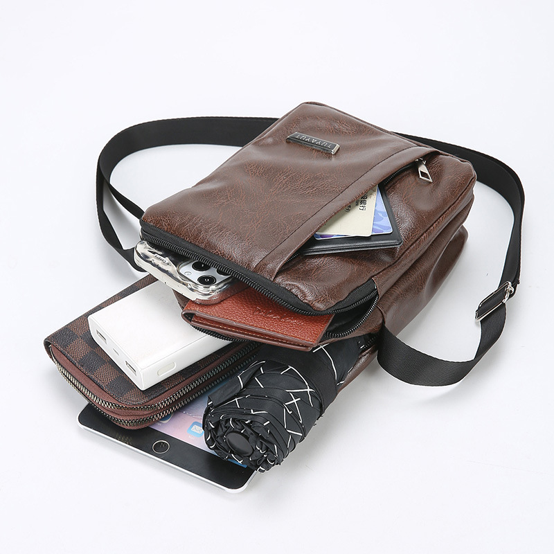 Bolsa de hombro de hombre transfronteriza universal PU cuero de color sólido bolso vertical simple para teléfonos móviles de gran capacidad de transporte diario mochila