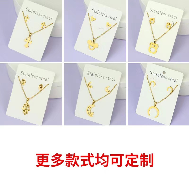 Net Red Butterfly Love Cross Personalidad Simple Juego de joyas de acero inoxidable Pendientes de oro Juego de collar al por mayor