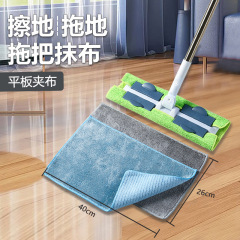 お下げのモップは布の代わりにタオルを挟んで二重に厚く吸水します。