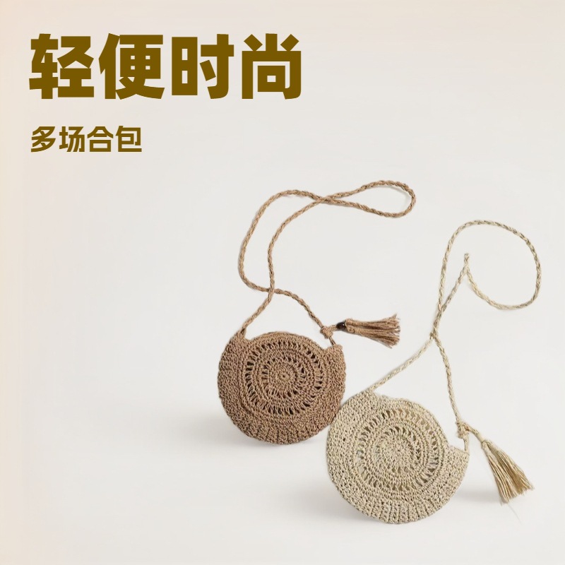 新款手工钩针单肩斜挎编织包镂空草编包圆形流苏女包度假沙滩包
