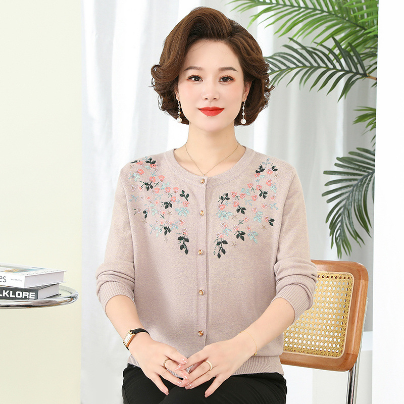 Thin knitted sweater with a round collar