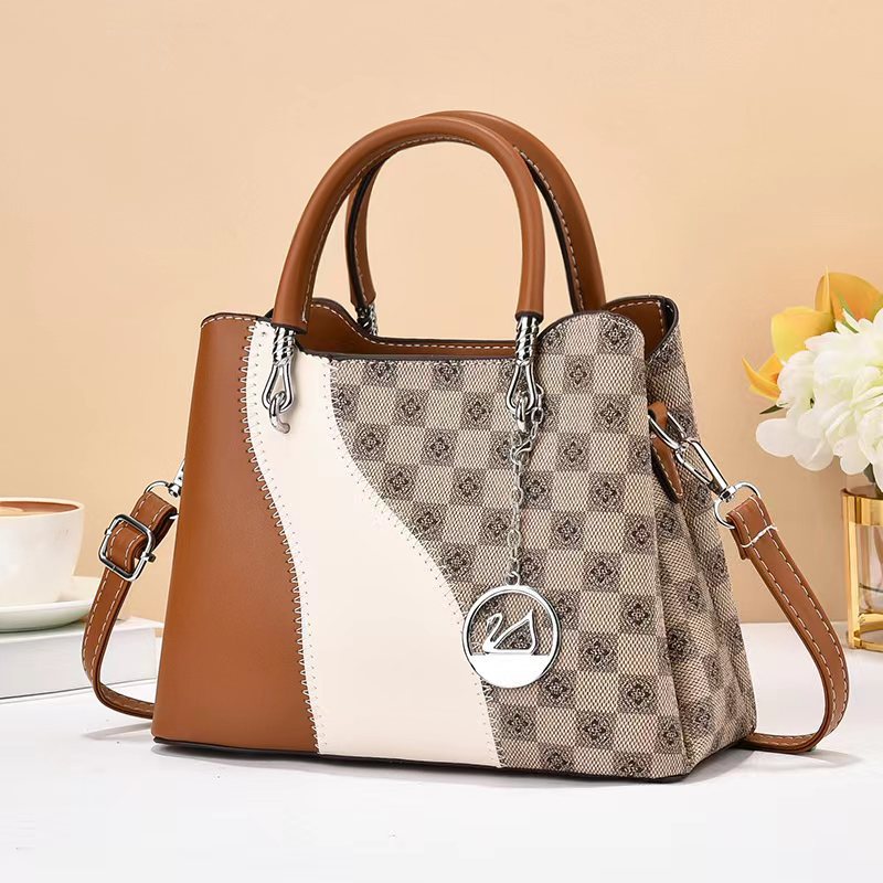 Fabricantes de bolsas de mano de textura nuevas bolsas de mujer de comercio exterior Taizhou bolsas de mujer una bolsa clásica