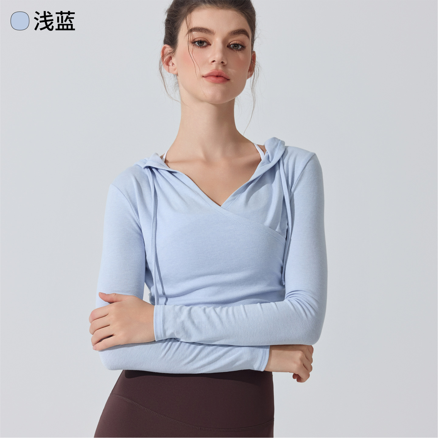 Europa y Estados Unidos trajes de yoga encapuchados transfronterizos mangas largas cintura reducida camiseta deportiva de correr delgada camiseta transpirable pilates camiseta de fitness