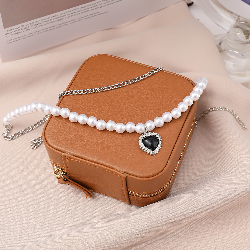 Creative Simple Multi-layer Black Heart Double-layer Pearl Chain Alloy Necklace display picture 3