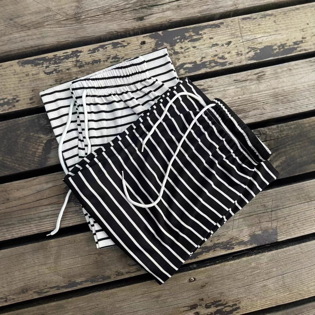 Pantalones anchos a rayas en blanco y negro para mujer, nuevos pantalones de caída de seda de hielo de todo fósforo de cintura alta, pantalones casuales de trapeador con cordón suelto delgado