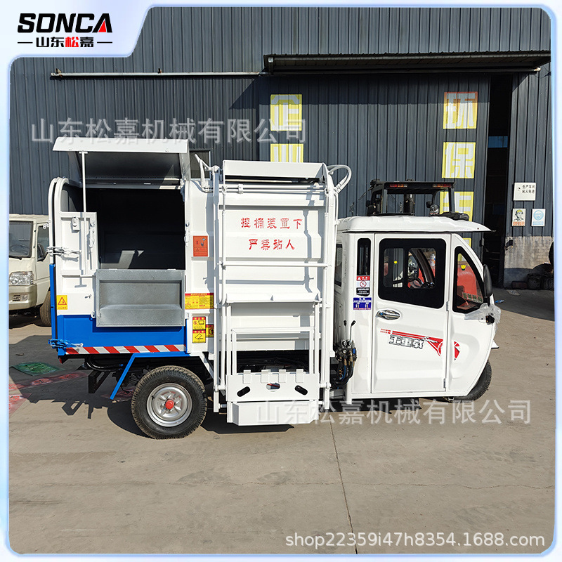 Vehículo de limpieza de basura de 4 toneladas de autocarga y descarga de propiedad de la comunidad de descarga de basura eléctrica de cuatro ruedas