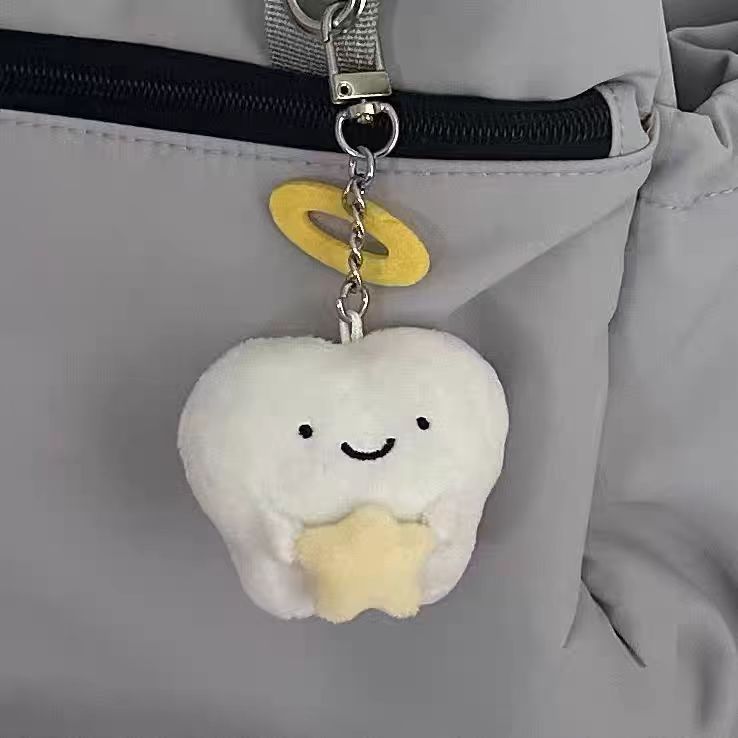 Muñeca de alto valor de ángel diente muñeca corazón roto dientes peludos colgante pareja muñeca regalo llavero