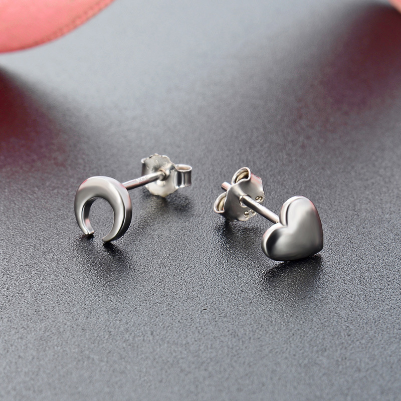 Estilo japonés y coreano dulce fresco pendientes s925 plata asimétrica estrella Luna pendientes estrella Luna joyería entrega de una sola pieza