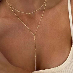 欧米の国境を越えて人気のあるファッション気質の多層は、長いアクセサリーの金属チェーンのフリンジ鎖のネックレスを重ねることができる