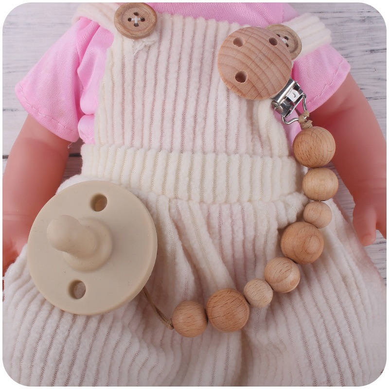 Nuevos suministros para bebés Beech clip calmante bebé Beech beads molar mordedura juguete anti-caída de la cadena Amazon