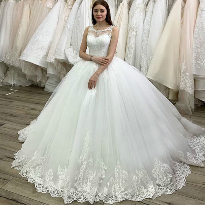 Vestido de novia europeo y americano para comercio exterior, novedad de verano 2026, vestido de novia de encaje blanco con apliques, estilo princesa, con cordones y cola larga para mujer.