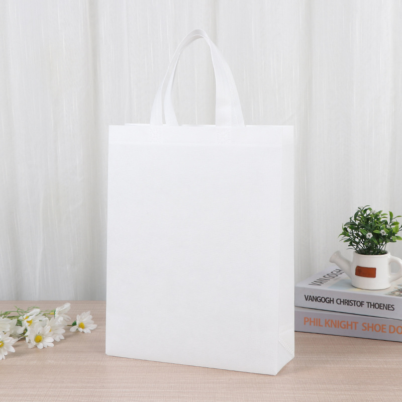 Bolsa de mano no tejida de color vertical en stock para aumentar el embalaje de regalo en blanco imprimible logotipo bolsas no tejidas