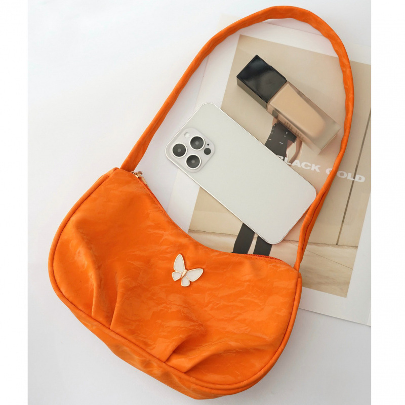 Bolsa de mariposa para mujeres 2025 verano nuevo estilo diario simple con casualidad de color sólido de hombro plegado en la parte inferior de la camisa