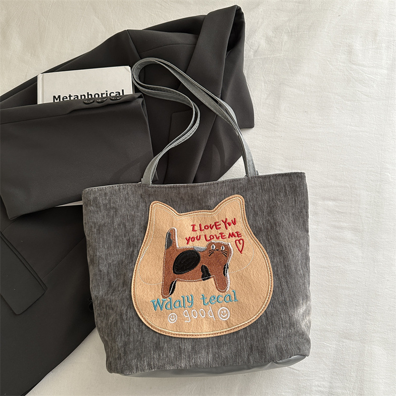 Bagos de gran capacidad para chicas encantadoras otoño / invierno 2024 nuevo estilo retro bolso de hombro de moda alta sensación bolso de brazo