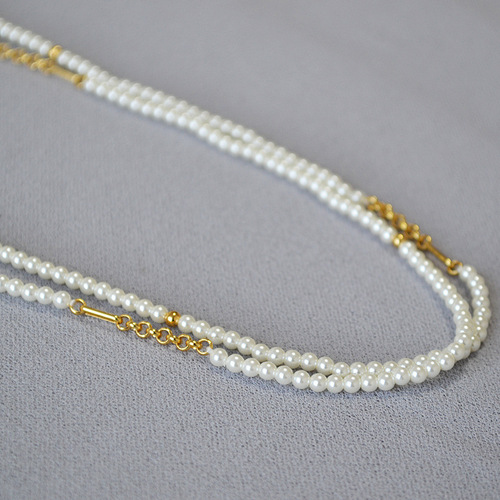 French-style minimalist Chanel-inspired high-luster small pearl chain multi-layer long pendant necklace for women to layer in autumn and winter