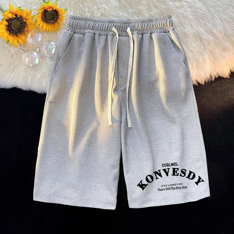 Waffle casual minimalista para hombres, camiseta de manga corta de verano, pantalones cortos para hombres con un conjunto de ropa de moda.