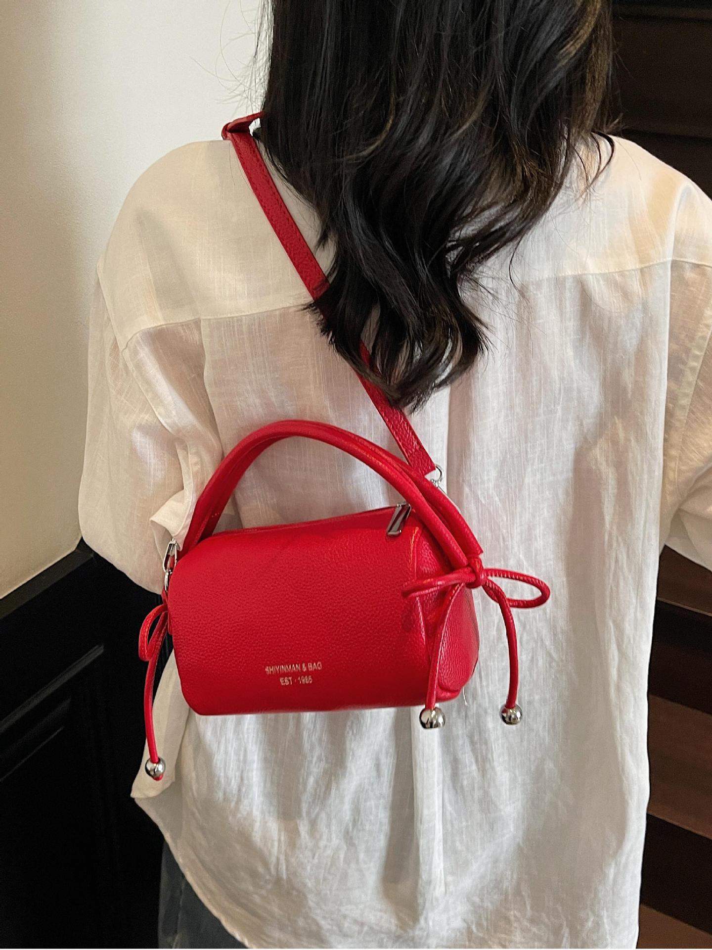 Bolso de mano simple coreano para mujeres 2025, nuevo tipo de bolso de viaje, bolso casual, ligero y de alta calidad.