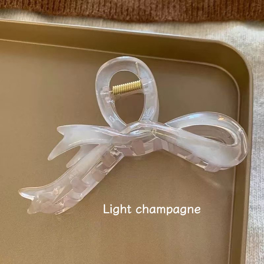 Light champagne ribbon bow