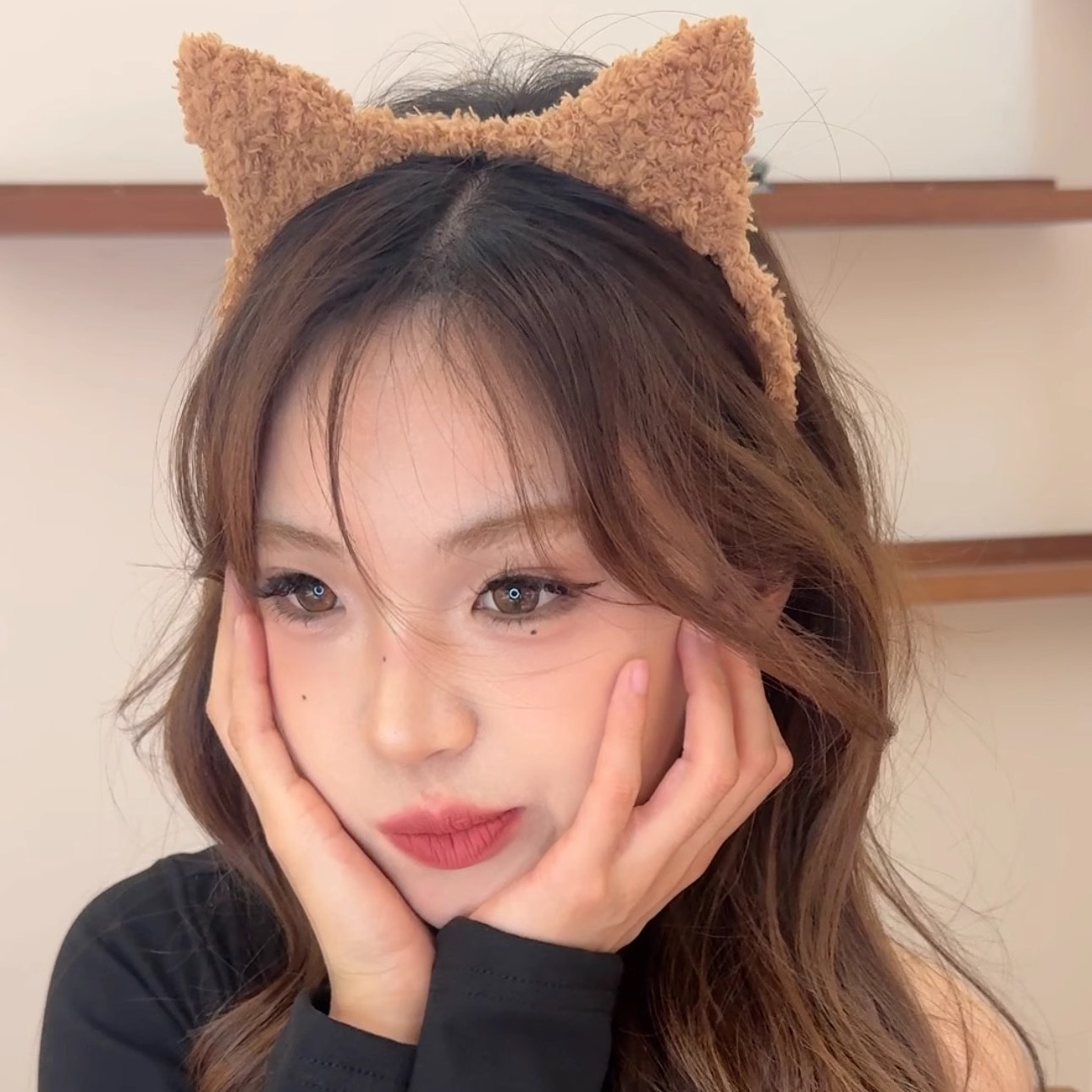 A khaki cat ear headband
