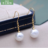 Fashionable earrings from pearl, silver 925 sample