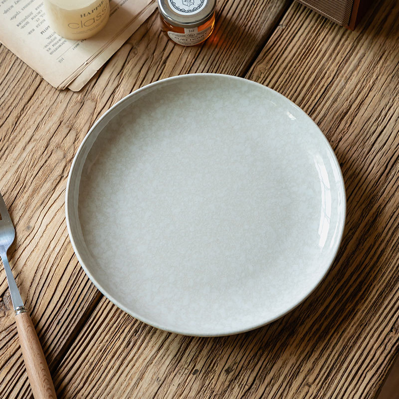 Plato de cerámica de alto valor de superficie, plato de piedra de nieve, plato de comedor doméstico, plato de platos, platos de platos de comedor al por mayor