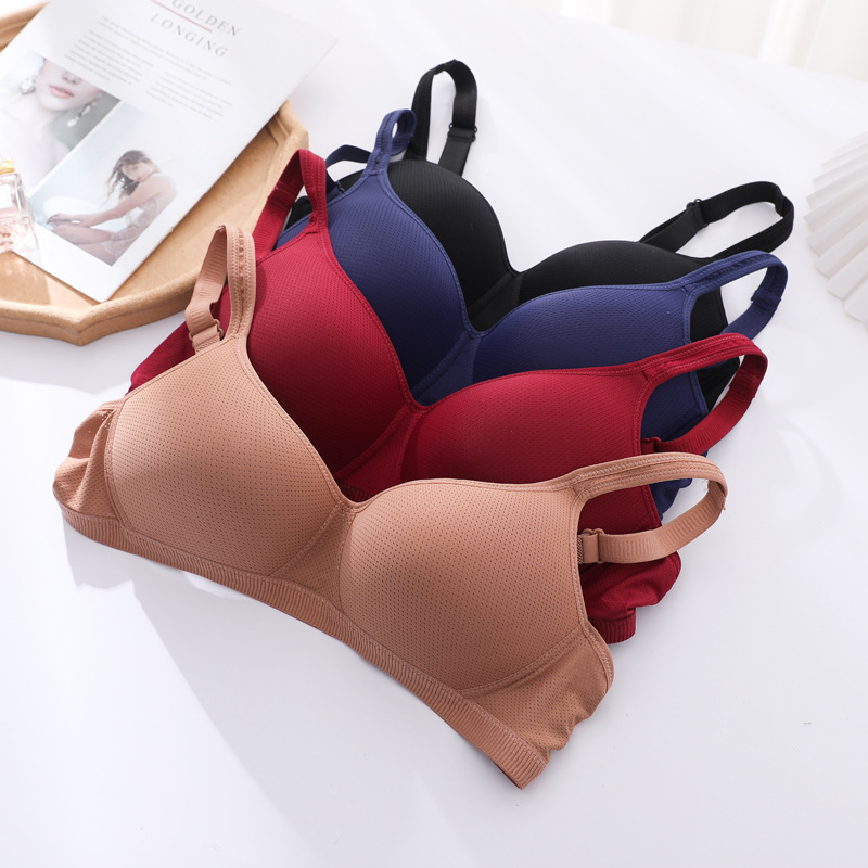 Fábrica de stock sin anillo de acero ligero delgado y transpirable sin ropa interior esponja, gran pecho pequeño sujetador anti-caída
