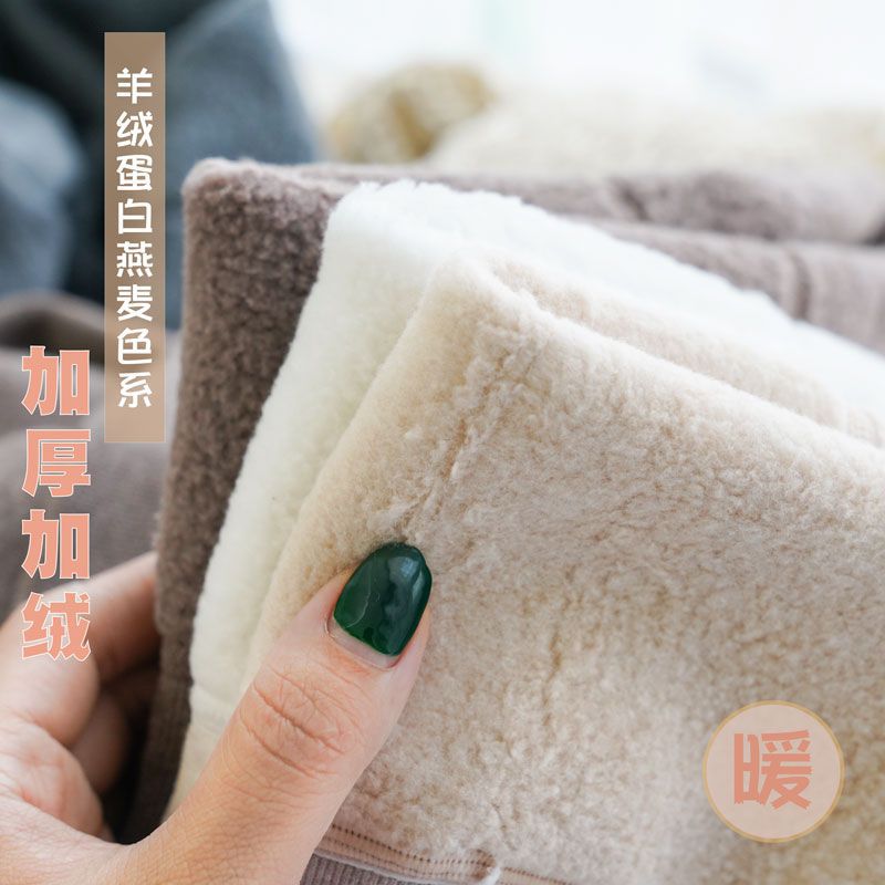 カシミヤの底のズボンの女性のベルベットの厚いズボンの靴下の春秋冬の系のオート麦の白い薄い色の縦の紋様の保温のズボンはやせています。