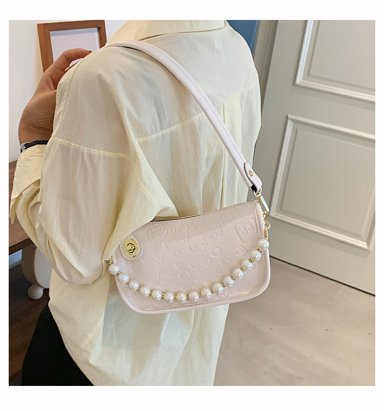 Simple Cartoon Embossed Solid Color Pearl Chain Messenger Bag display picture 9