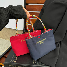 彩绳手提包春夏休闲百搭刺绣字母女包吸睛便携多功能收纳手拎包