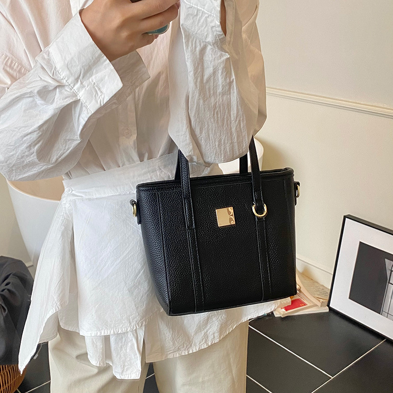 Tendencias de moda de comercio exterior bolso de cubo de mano femenino 2025 nuevo estilo estilo occidental bolso de hombro todo fósforo bolso de mensajero de viaje de trabajo