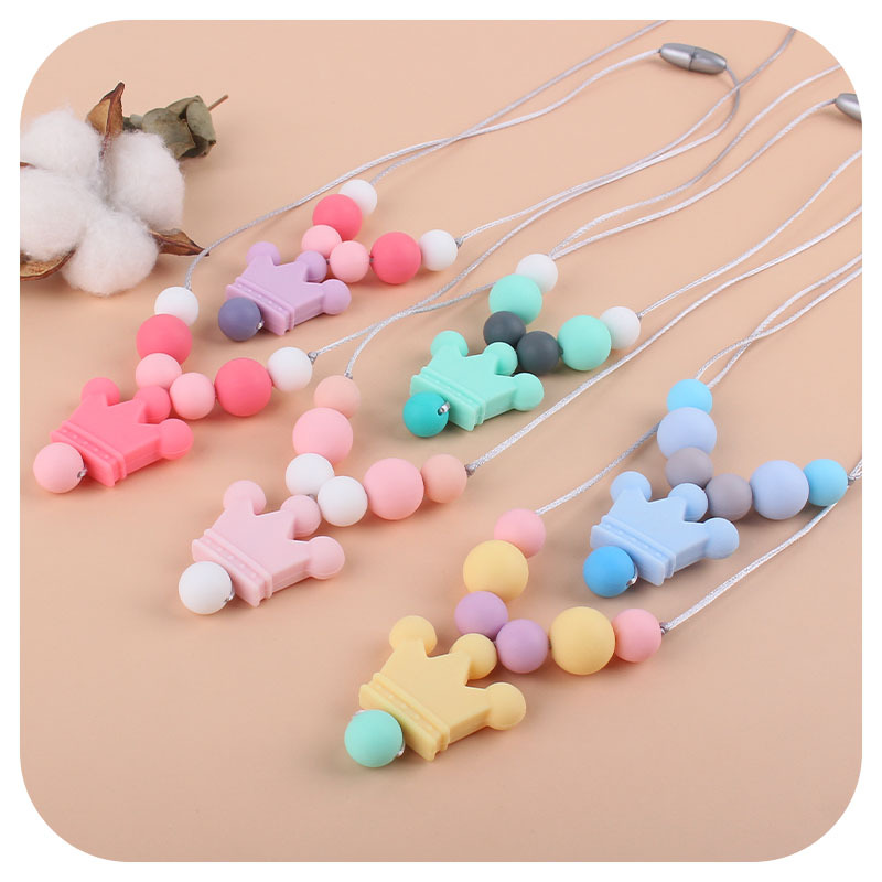 Amazon nuevo silicona corona molar collar bebé suministros teether palo masticable colgante collar