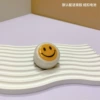 Hand patting the smile light