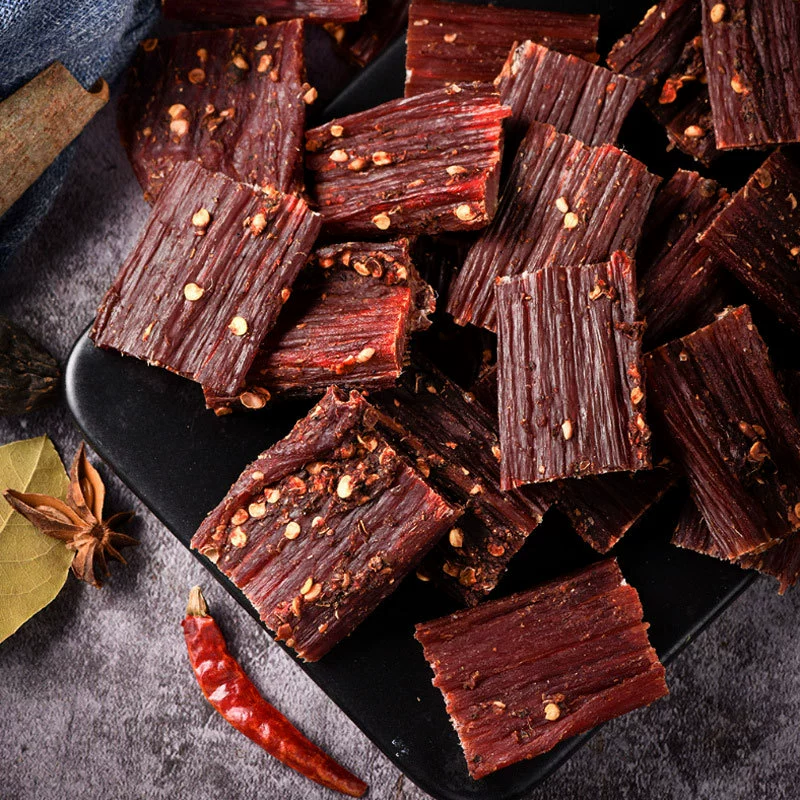 Сушёная говяжья jerky рука рвать говяжья закуска живописная ярмарка будет воздухом высушенный свинина jerky повседневная еда производители