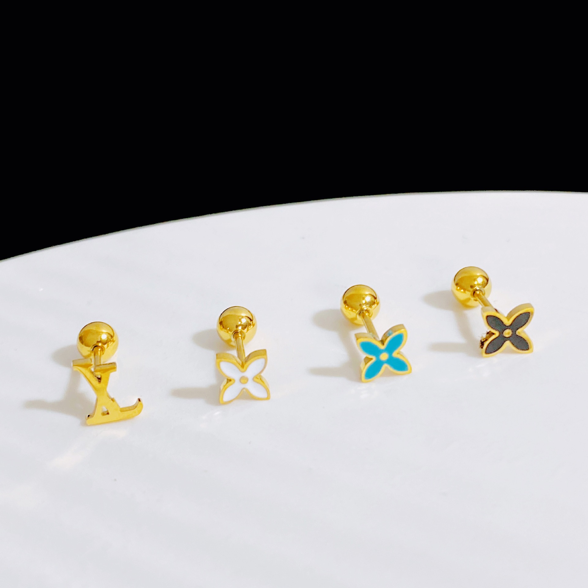 Simple Style Four Leaf Clover Titanium Steel Plating Ear Studs 4 Piece Set