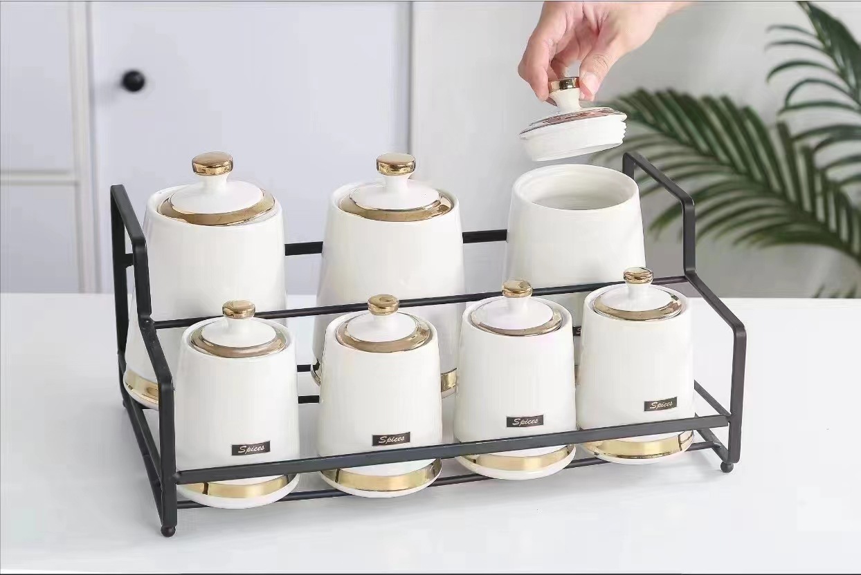 Estilo nórdico botella de condimento de cerámica de lujo ligero de alta apariencia hogar cocina condimento tarro de almacenamiento combinación sal azúcar traje creativo