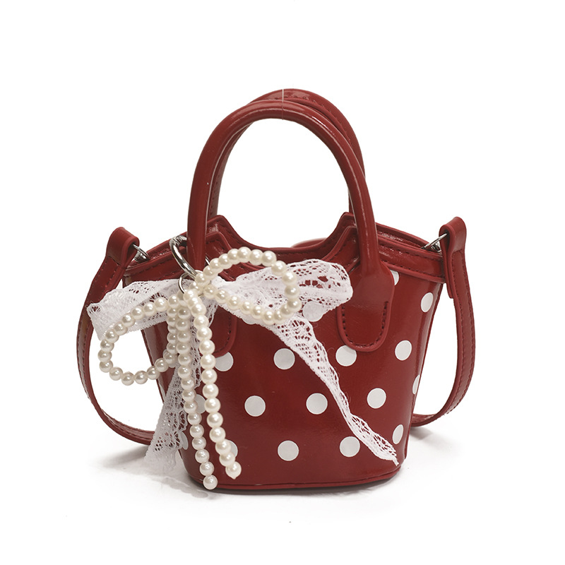 Xiaozhong Mini onda punto bolso de mujer 2025 nuevo estilo coreano de moda versátil bolso portátil pequeño bolso de cubo