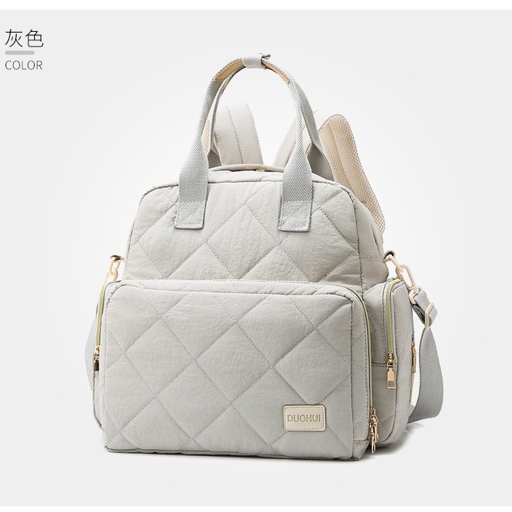 Comercio exterior hilo de bordar de alta calidad, bolso de madre y bebé a cuadros, bolso de mamá, cambiador, separación en seco y húmedo, mochila de viaje anti-salpicaduras