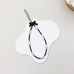Japanese and Korean new Xiaohongshu INS style bow pearl acrylic bead fashionable anti-lost keychain phone chain