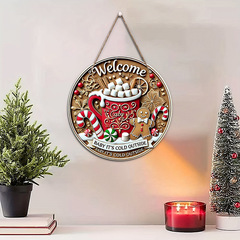 現物のアメリカの田舎のクリスマスの祝日の丸い表札は木製の歓迎の札を掛けます。