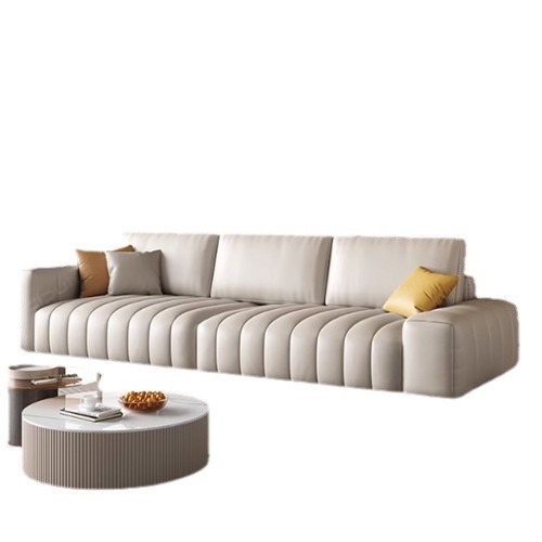 Estilo italiano Luz de lujo estilo crema primera capa de sofá de piel de vaca apartamento grande y pequeño abajo esponja suave cubierta de acero piano clave sofá de cuero