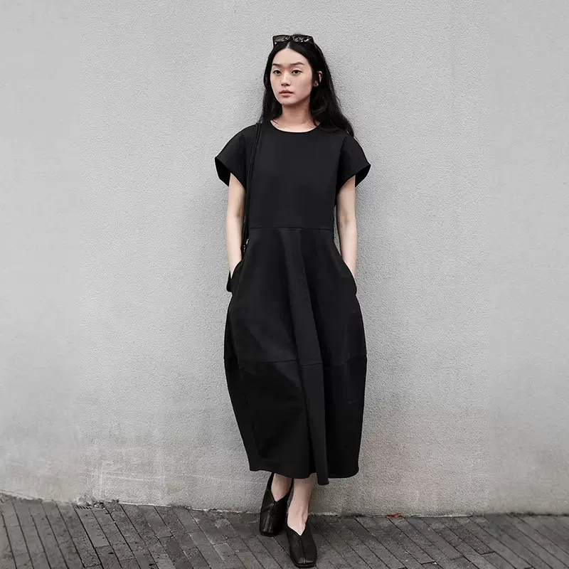 高级感黑色连衣裙女2026春季新款收腰显瘦花苞裙休闲通勤长裙