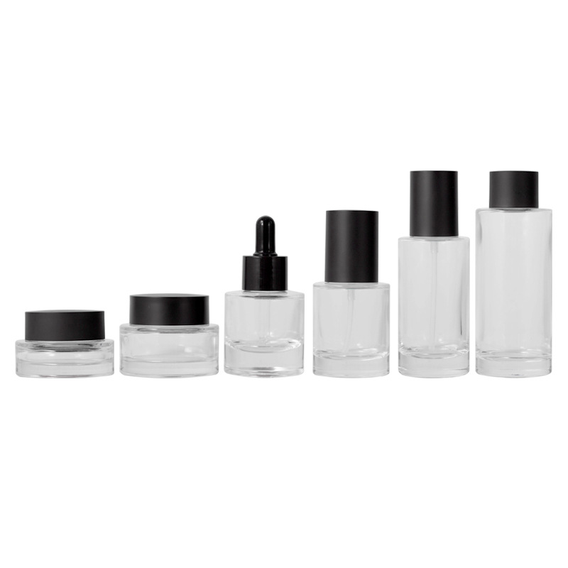Nuevo Xumin conjunto de vidrio cosmético botella de crema de fondo grueso transparente botella 100mL botella de spray de cubierta negra botella de loción